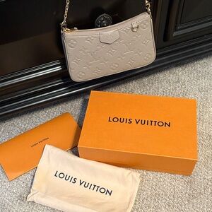Louis Vuitton Cream Monogram Clutch